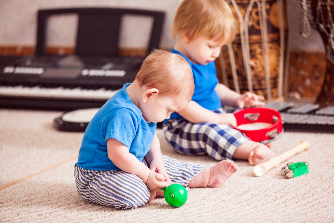 Toddlers Playing with Musical Instruments Indoors